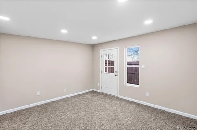 1021 Lake Ave, Pueblo, CO 81004 - empty room with carpet flooring, baseboards, and recessed lighting