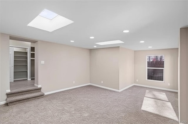 1021 Lake Ave, Pueblo, CO 81004 - unfurnished room featuring carpet flooring, baseboards, recessed lighting, and a skylight