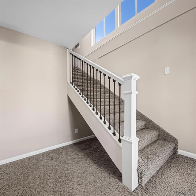 1021 Lake Ave, Pueblo, CO 81004 - staircase with carpet flooring and baseboards