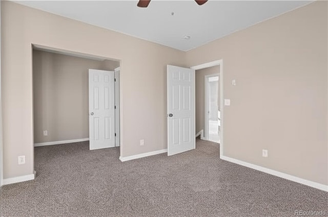 1021 Lake Ave, Pueblo, CO 81004 - unfurnished bedroom with carpet floors, baseboards, and ceiling fan