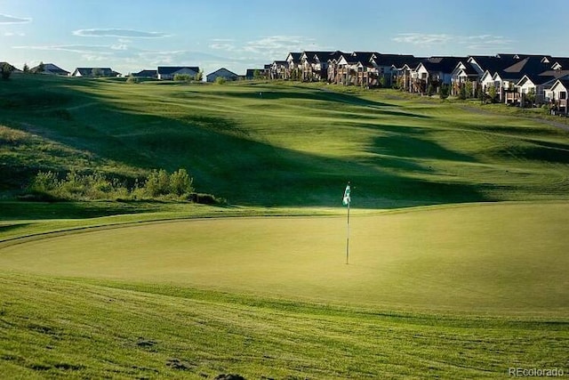 7746 S Valdai Ct, Aurora, CO 80016 - view of community featuring a residential view, golf course view, and a lawn