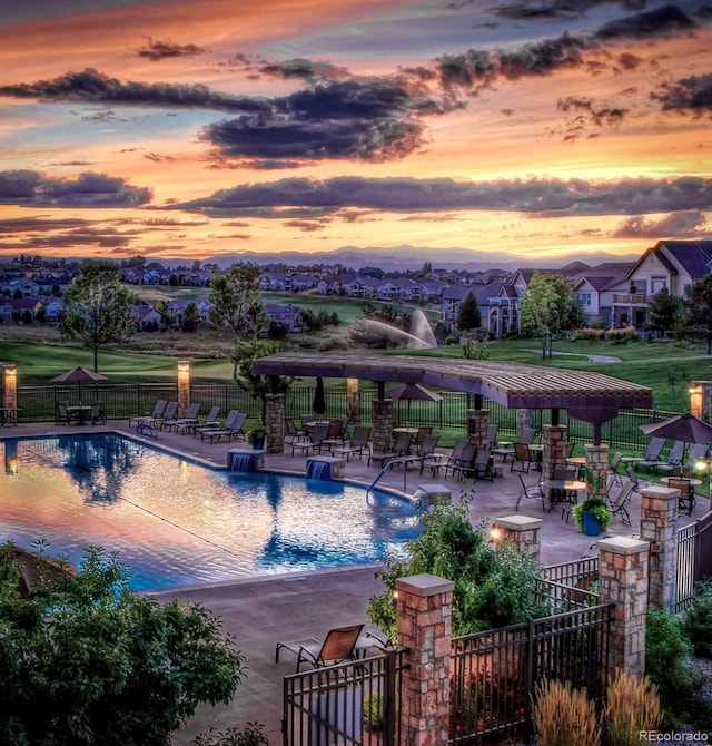 7746 S Valdai Ct, Aurora, CO 80016 - community pool with a patio area