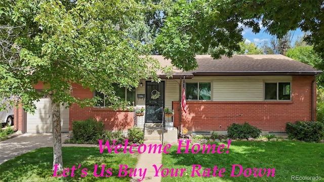 view of front of home featuring a garage and a front lawn