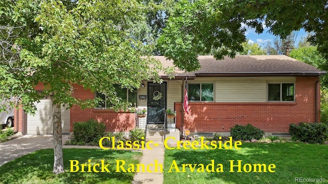 view of front of home with a garage, concrete driveway, brick siding, and roof with shingles