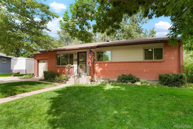 single story home featuring brick siding, a front lawn, and an attached garage