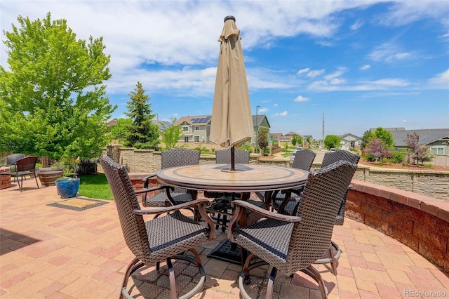 24351 E Alamo Dr, Aurora, CO 80016 - view of patio / terrace with outdoor dining area and a residential view
