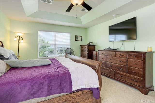 24351 E Alamo Dr, Aurora, CO 80016 - carpeted bedroom featuring a tray ceiling and ceiling fan