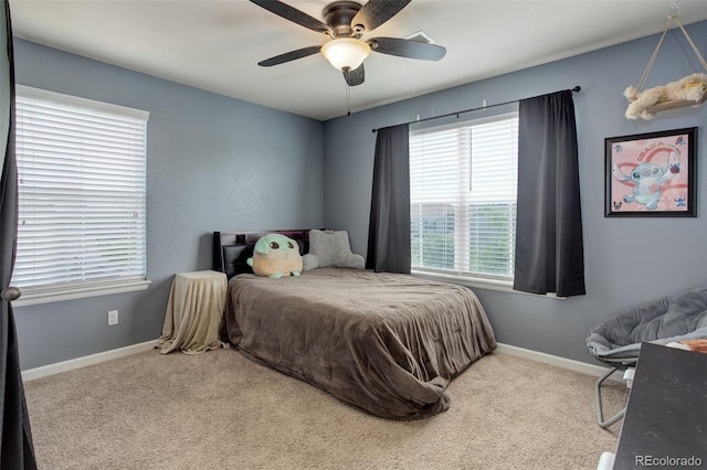 24351 E Alamo Dr, Aurora, CO 80016 - carpeted bedroom featuring baseboards and a ceiling fan