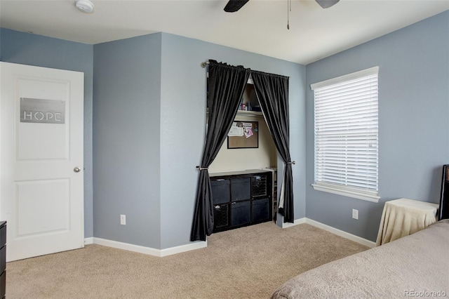 24351 E Alamo Dr, Aurora, CO 80016 - bedroom with carpet flooring, multiple windows, baseboards, and a ceiling fan