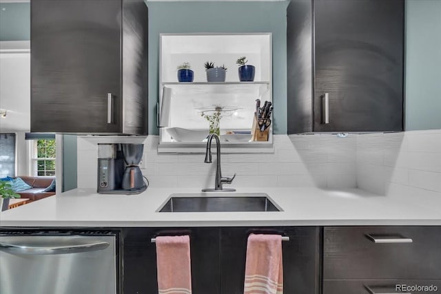 1648 S Locust St, Denver, CO 80224 - kitchen with dishwasher, modern cabinets, light countertops, and decorative backsplash
