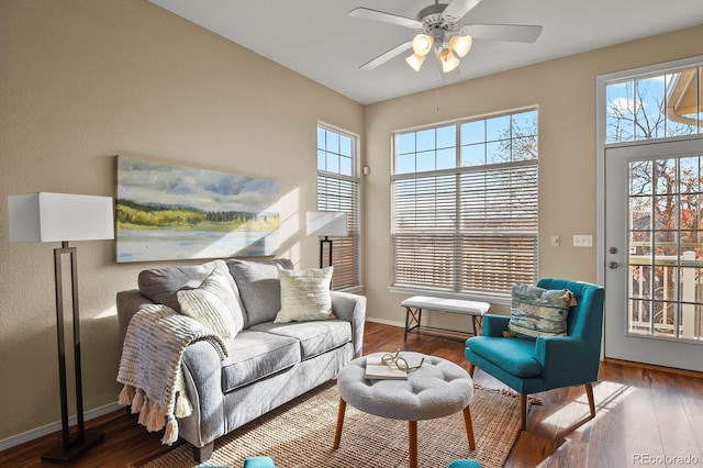 living room featuring a wealth of natural light, hardwood / wood-style floors, and ceiling fan