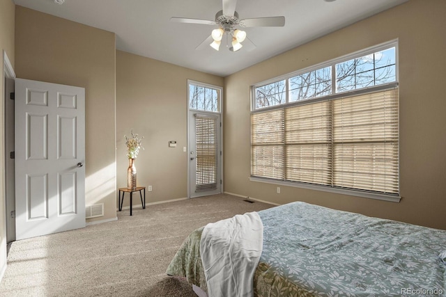 bedroom featuring carpet, access to outside, and ceiling fan