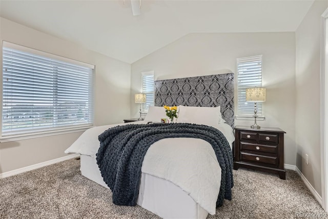 carpeted bedroom featuring lofted ceiling