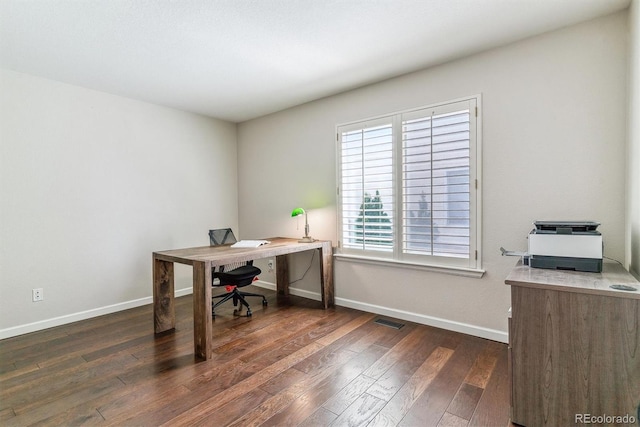 9109 Ironwood Way, Highlands Ranch, CO 80129 - office area featuring baseboards, hardwood / wood-style floors, and visible vents