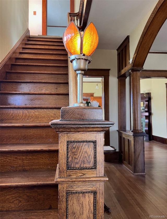 405 2nd Ave, Monte Vista, CO 81144 - stairway featuring wood finished floors and decorative columns