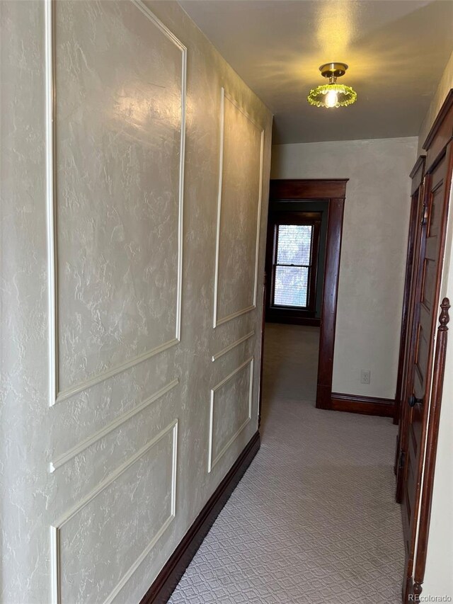405 2nd Ave, Monte Vista, CO 81144 - corridor with carpet floors and baseboards
