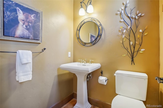 44 Canyon Ct, Eagle, CO 81631 - bathroom with toilet, baseboards, and a sink