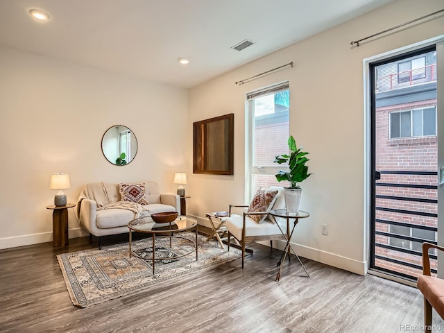 2374 S University Blvd Unit 205, Denver, CO 80210 - living area with wood finished floors and recessed lighting