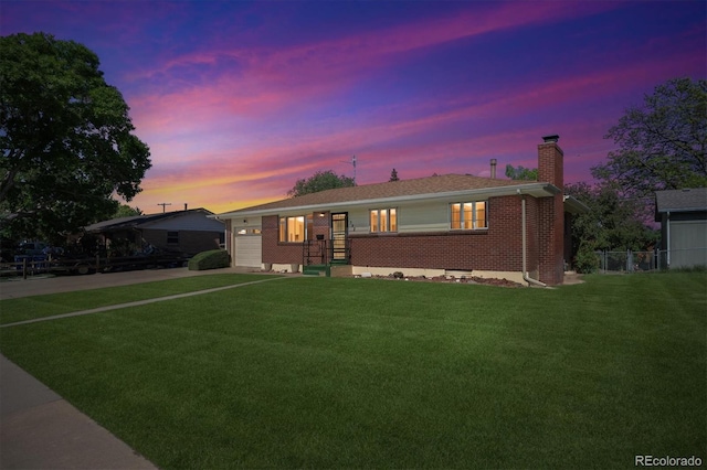 392 Central Ave, Brighton, CO 80601 - single story home featuring brick siding, a chimney, a garage, and concrete driveway