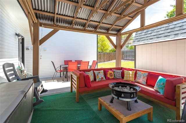 19630 E Purdue Pl, Aurora, CO 80013 - view of patio / terrace with an outdoor living space with a fire pit, outdoor dining space, and a storage shed