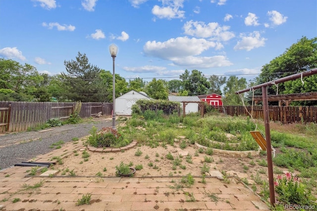 5935 Blanca Ct, Golden, CO 80403 - fenced backyard featuring an outdoor structure
