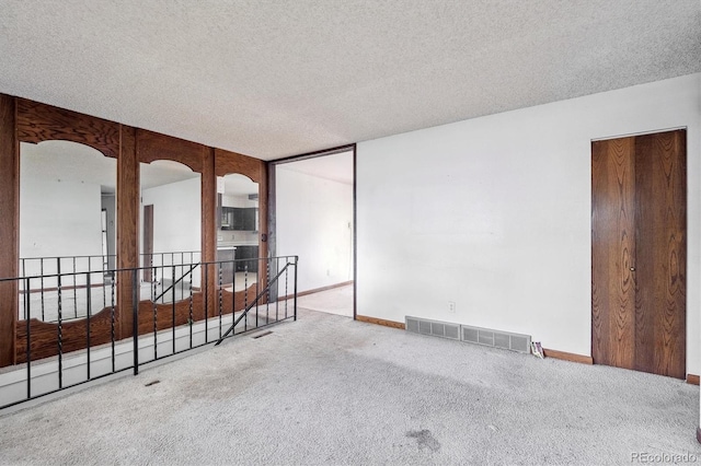 5935 Blanca Ct, Golden, CO 80403 - spare room featuring carpet and a textured ceiling