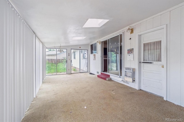 5935 Blanca Ct, Golden, CO 80403 - unfurnished sunroom featuring heating unit and a skylight