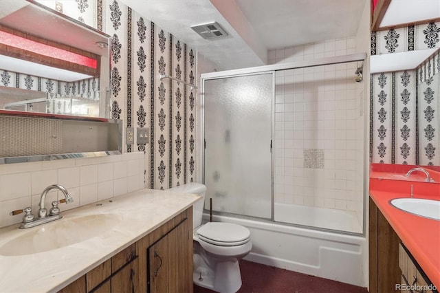 5935 Blanca Ct, Golden, CO 80403 - bathroom with vanity, tasteful backsplash, and bath / shower combo with glass door