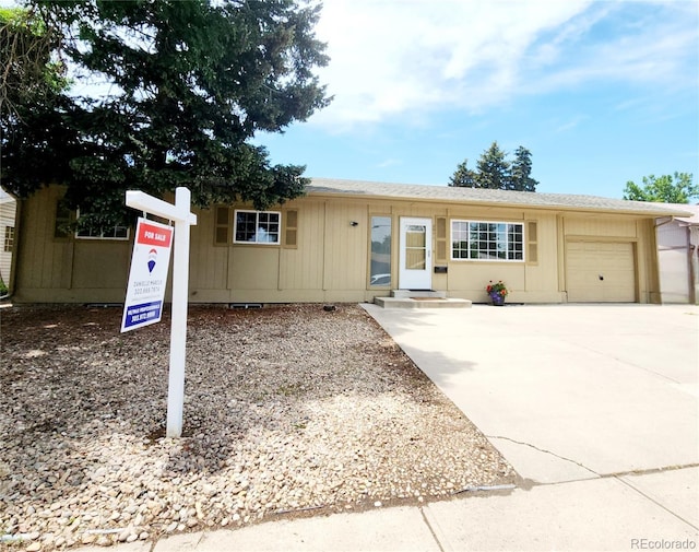2971 S Sheridan Blvd, Denver, CO 80227 - ranch-style home featuring a garage and driveway