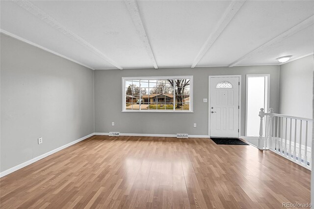 2971 S Sheridan Blvd, Denver, CO 80227 - entryway with beam ceiling, wood finished floors, and baseboards