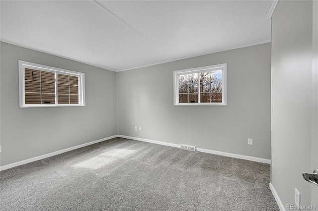 2971 S Sheridan Blvd, Denver, CO 80227 - carpeted spare room featuring baseboards and crown molding