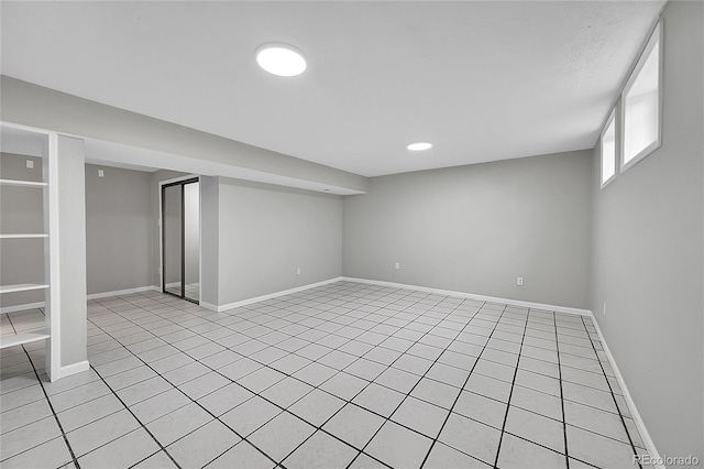 2971 S Sheridan Blvd, Denver, CO 80227 - finished basement with light tile patterned floors, baseboards, and recessed lighting