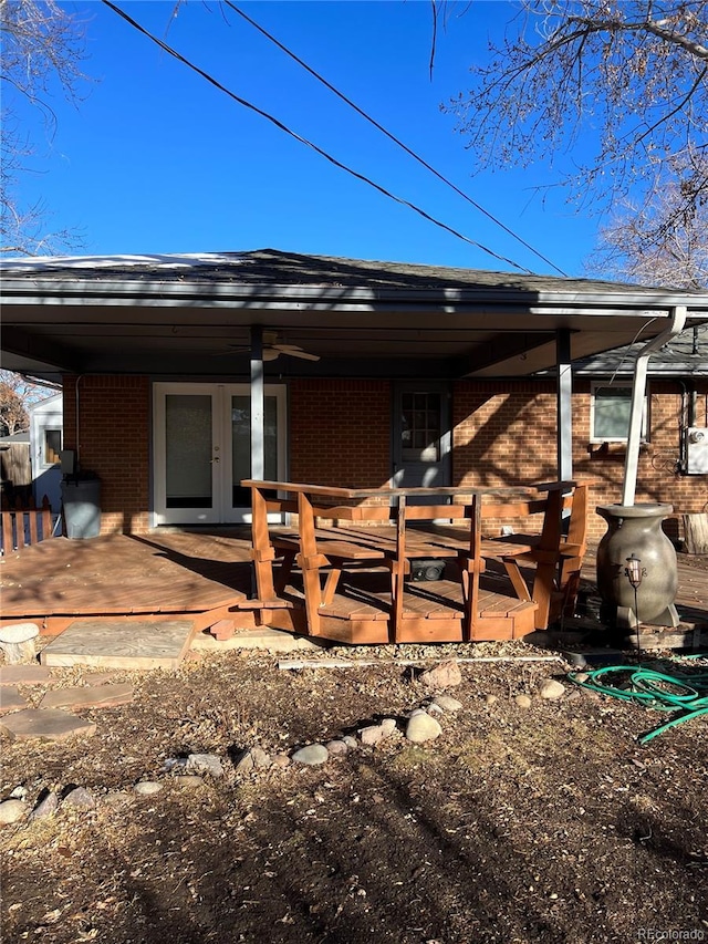 back of house with ceiling fan and french doors