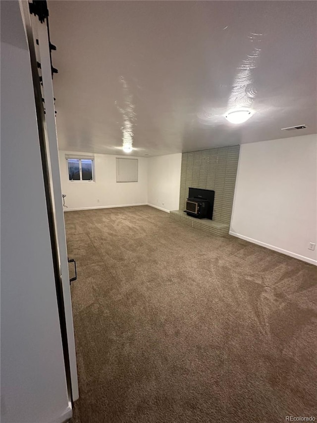 unfurnished living room with carpet flooring