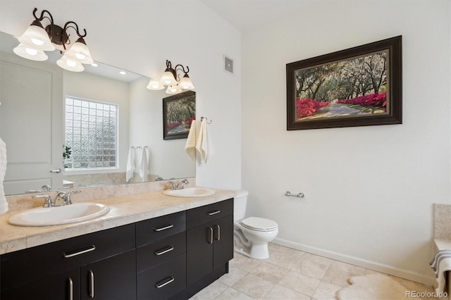 2100 N Humboldt St Unit 302, Denver, CO 80205 - full bath with a chandelier, double vanity, baseboards, and toilet