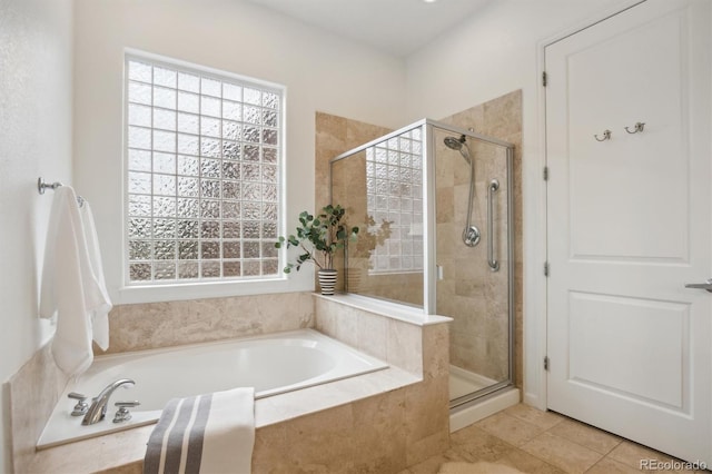 2100 N Humboldt St Unit 302, Denver, CO 80205 - bathroom featuring plenty of natural light, a garden tub, and a shower stall