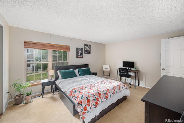 6937 S Knolls Way, Centennial, CO 80122 - bedroom featuring light carpet, a textured ceiling, and baseboards