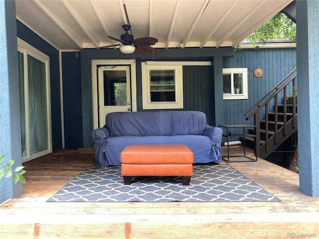 exterior space with ceiling fan