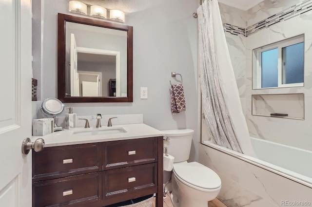 full bathroom featuring shower / bath combo with shower curtain, toilet, and vanity