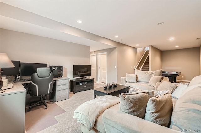 living room featuring baseboards, stairway, recessed lighting, and light colored carpet