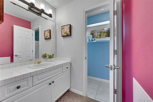 6681 Flintwood Rd, Parker, CO 80138 - bathroom with vanity and tile patterned flooring