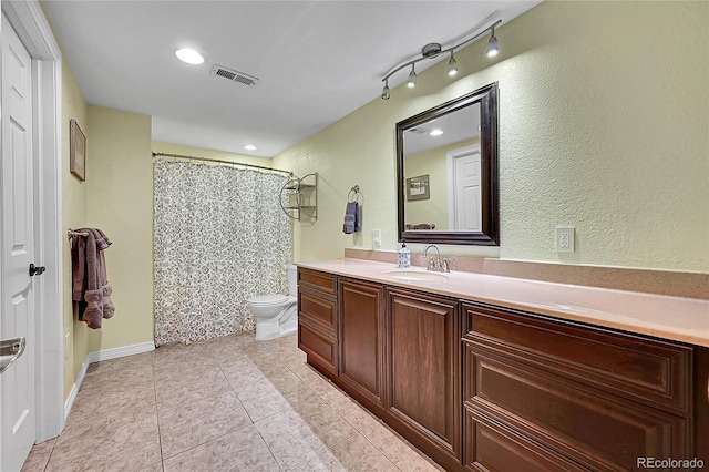 6681 Flintwood Rd, Parker, CO 80138 - full bath featuring vanity, a shower with curtain, a textured wall, and tile patterned floors