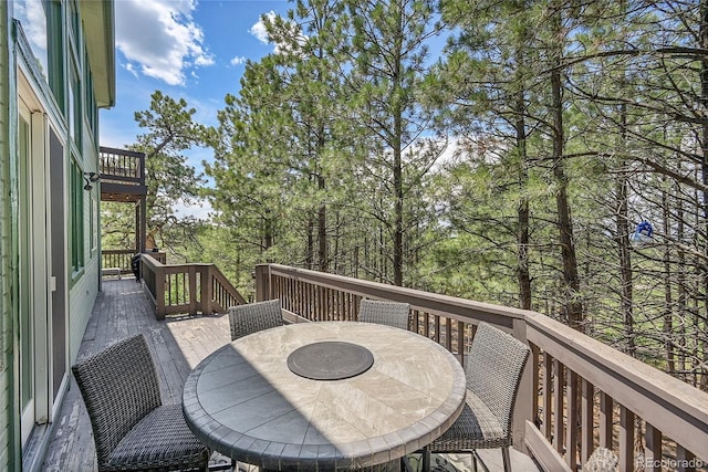 6681 Flintwood Rd, Parker, CO 80138 - wooden deck featuring outdoor dining area