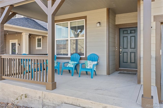 doorway to property featuring covered porch