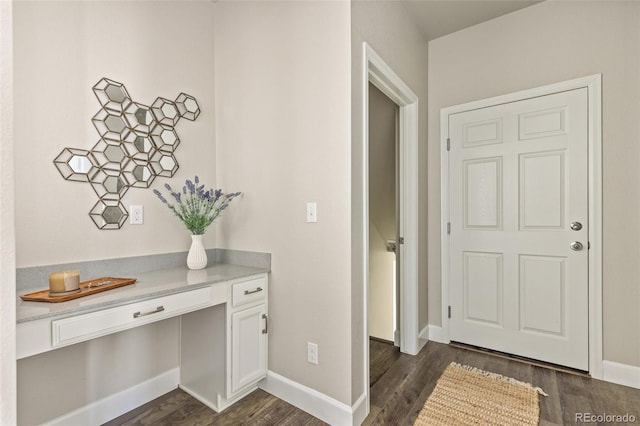 interior space with dark hardwood / wood-style floors