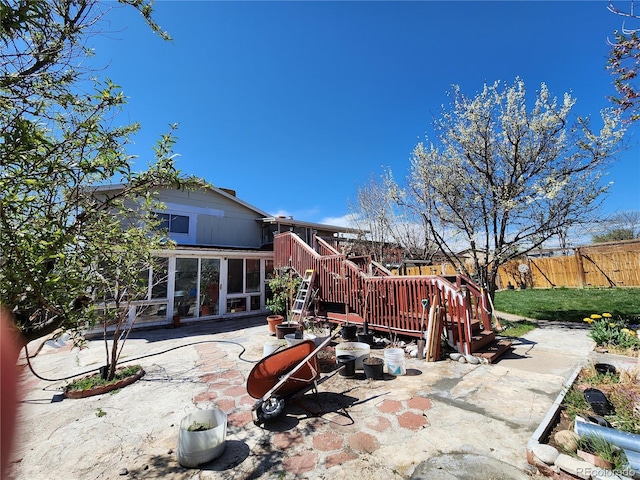 3341 E 99th Way, Thornton, CO 80229 - back of house with a sunroom and a patio