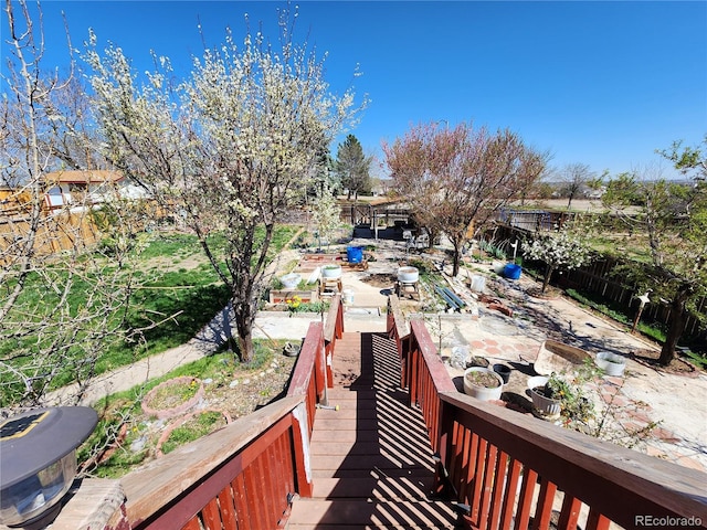 3341 E 99th Way, Thornton, CO 80229 - wooden terrace featuring a patio