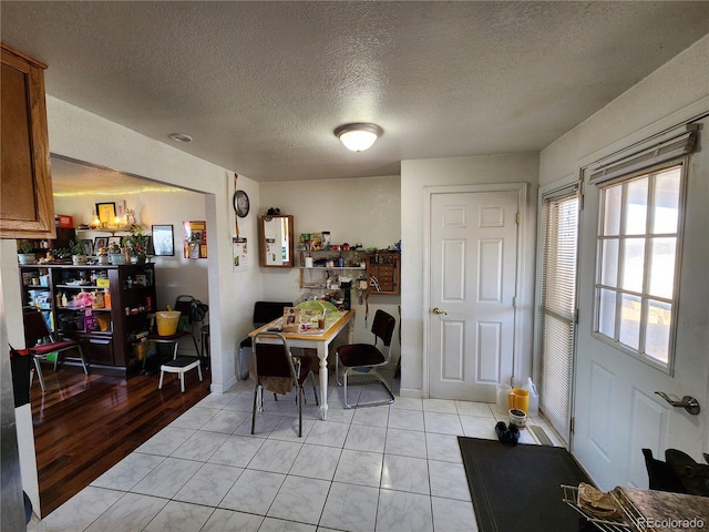 3341 E 99th Way, Thornton, CO 80229 - dining space featuring a textured ceiling
