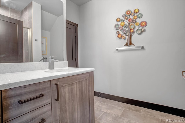 1111 E St, Salida, CO 81201 - bathroom featuring vanity and a shower with shower door