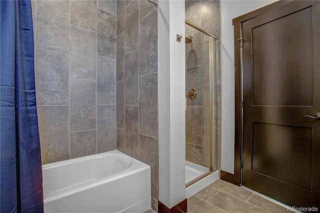 1111 E St, Salida, CO 81201 - bathroom with a stall shower, a garden tub, and tile patterned floors